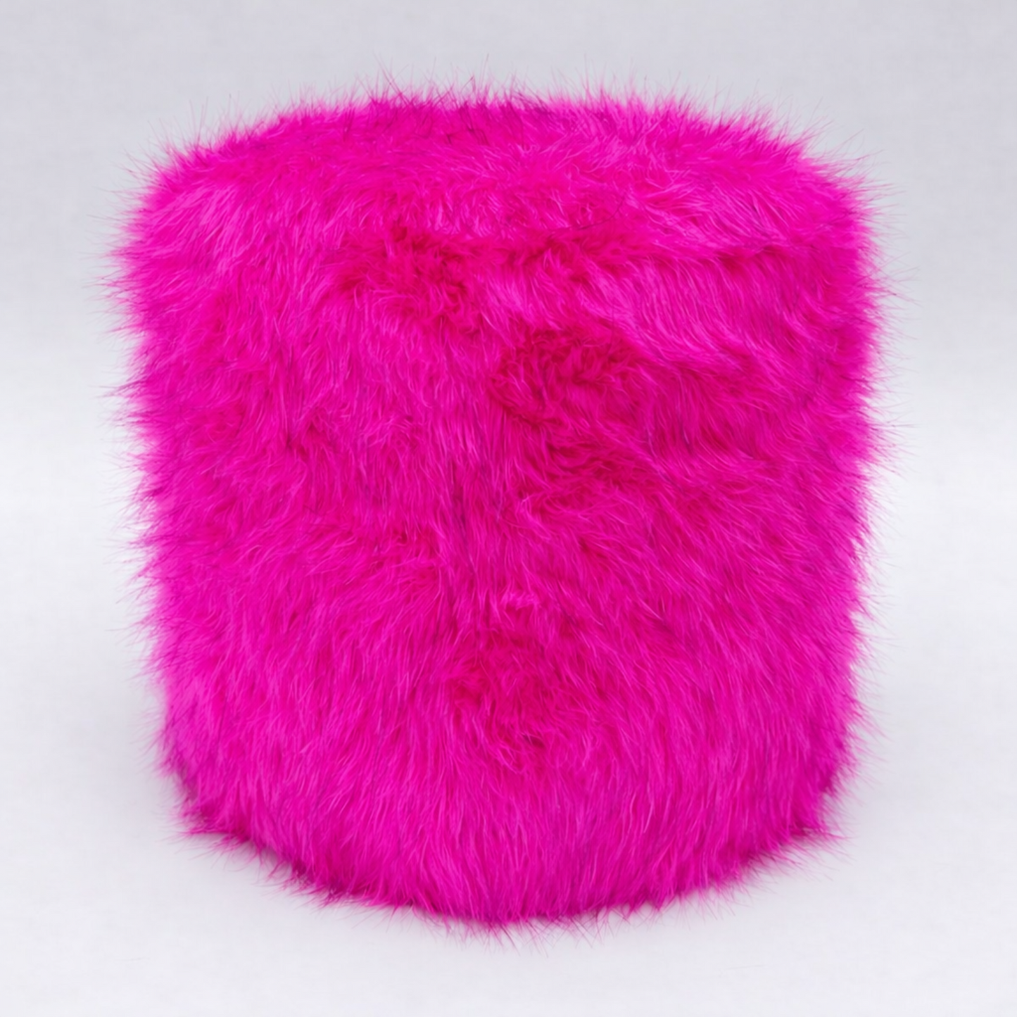 Puff circular peluche tonos calidos